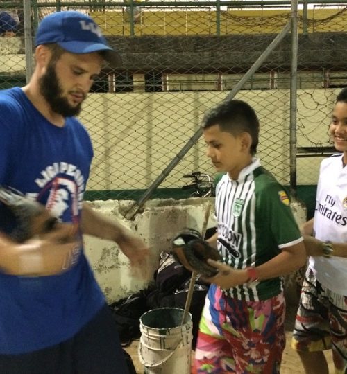 LaLigaPequena_3-29-16 - Night Camp - Handing Out Gloves (1)